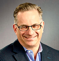 headshot of Adam Klaber